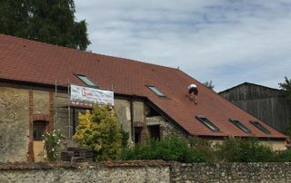 pose de Velux sur toit en tuiles